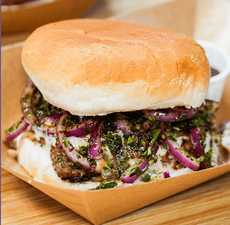 A Baytna Syrian kofta burger served in a takeaway box