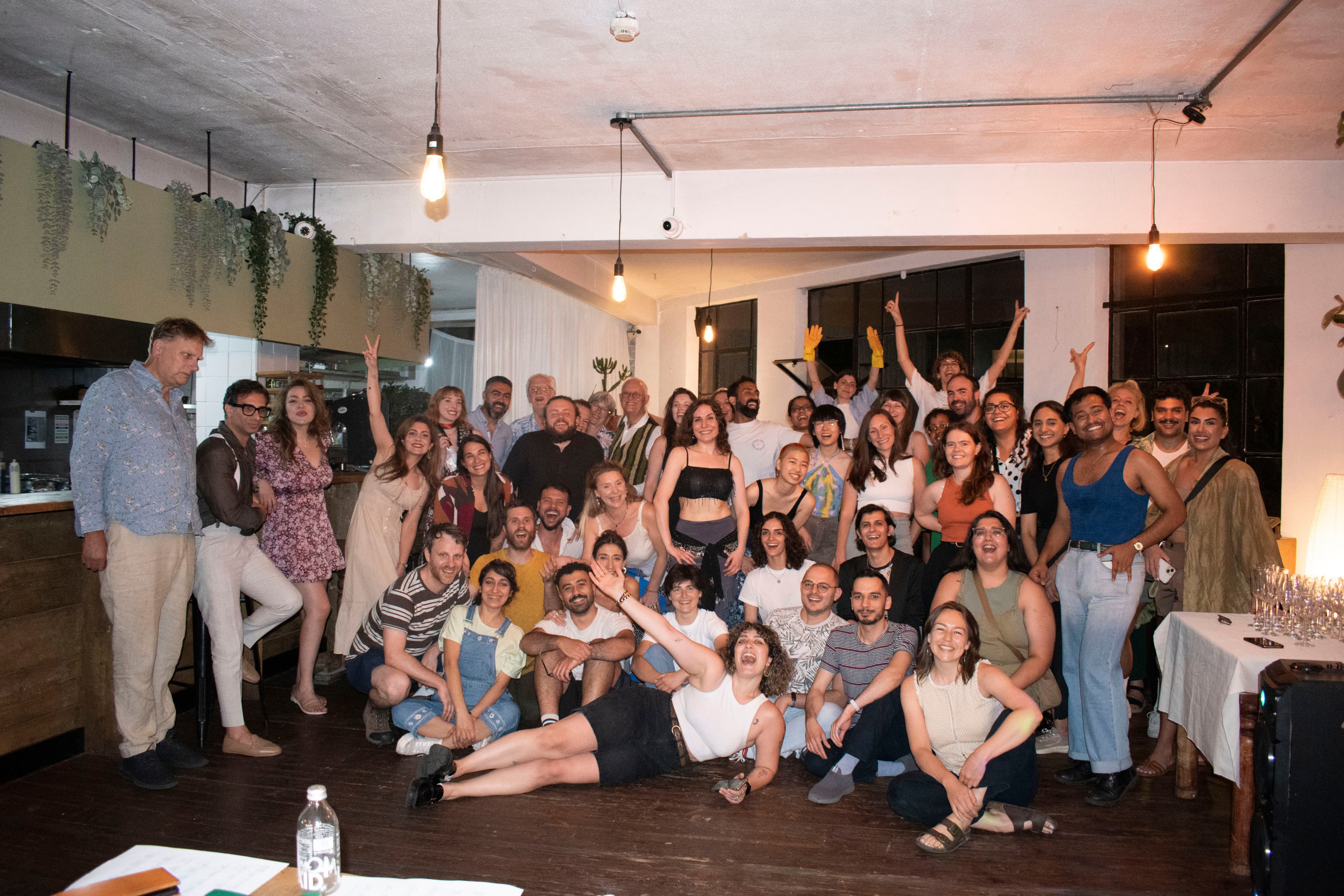 Guests posing together at the end of a Baytna dinner